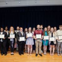 Participants with their certificates
